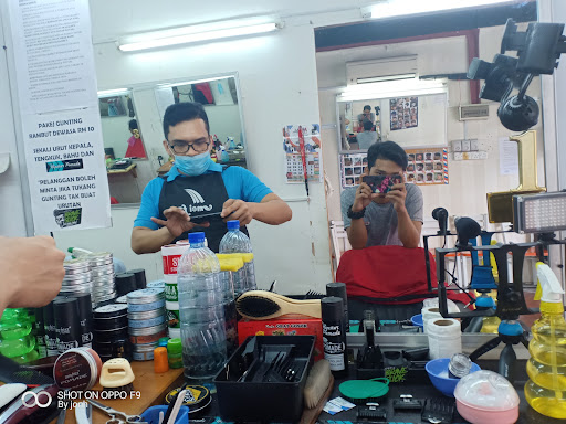 Kedai Gunting Rambut Arif